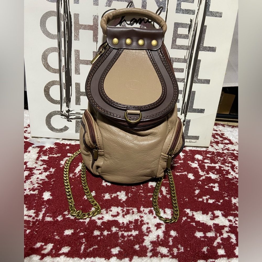 Two Tone Leather Convertible Backpack With Unbranded Bronze Tone Chain.